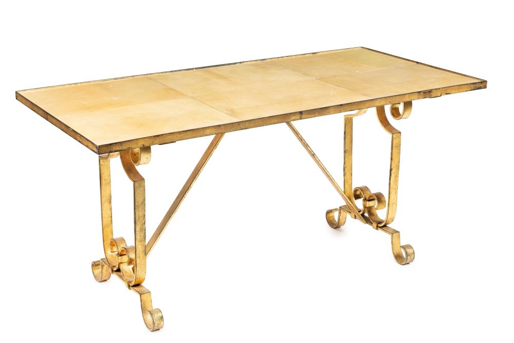 A stylish gilt metal table with parchment and glass top, French Circa 1950