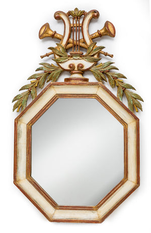 A very decorative hexagonal wall mirror with musical and leaf motifs, French 19th Century