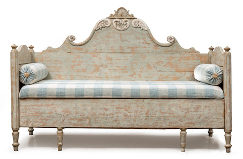 An elegant upholstered and painted timber day bed, Swedish 19th Century