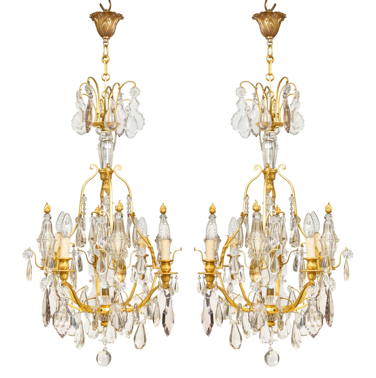 A exquisite pair of gilt bronze and crystal four-light obelisk chandeliers, French Circa 1930