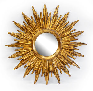 A beautifully moulded gilt resin sunburst wall mirror, French circa 1950