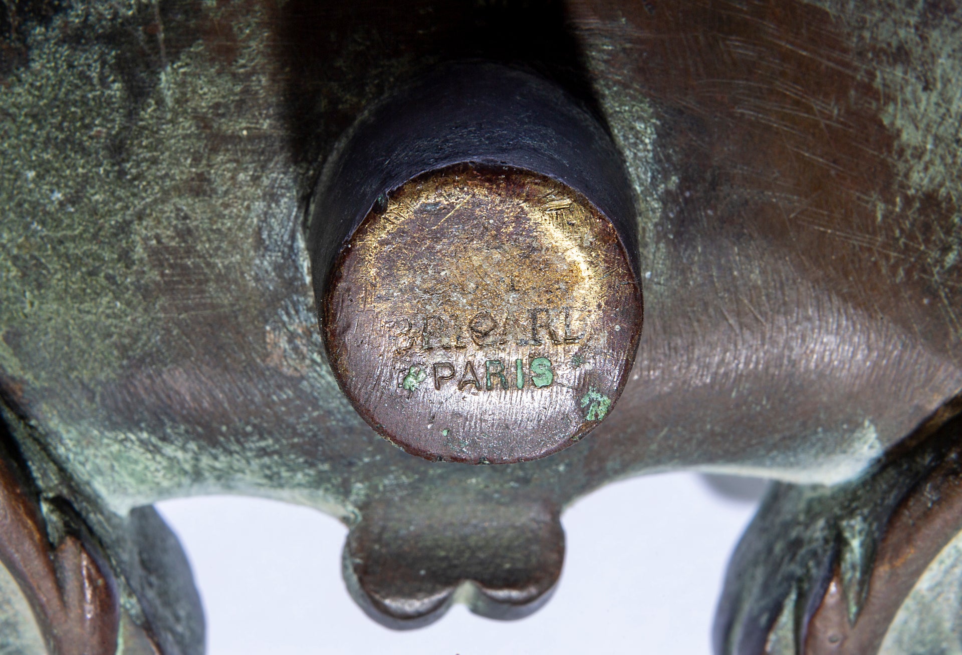 An exceptional pair of bronze door knockers, cast with the head of Neptune and twin dolphins French 19th Century