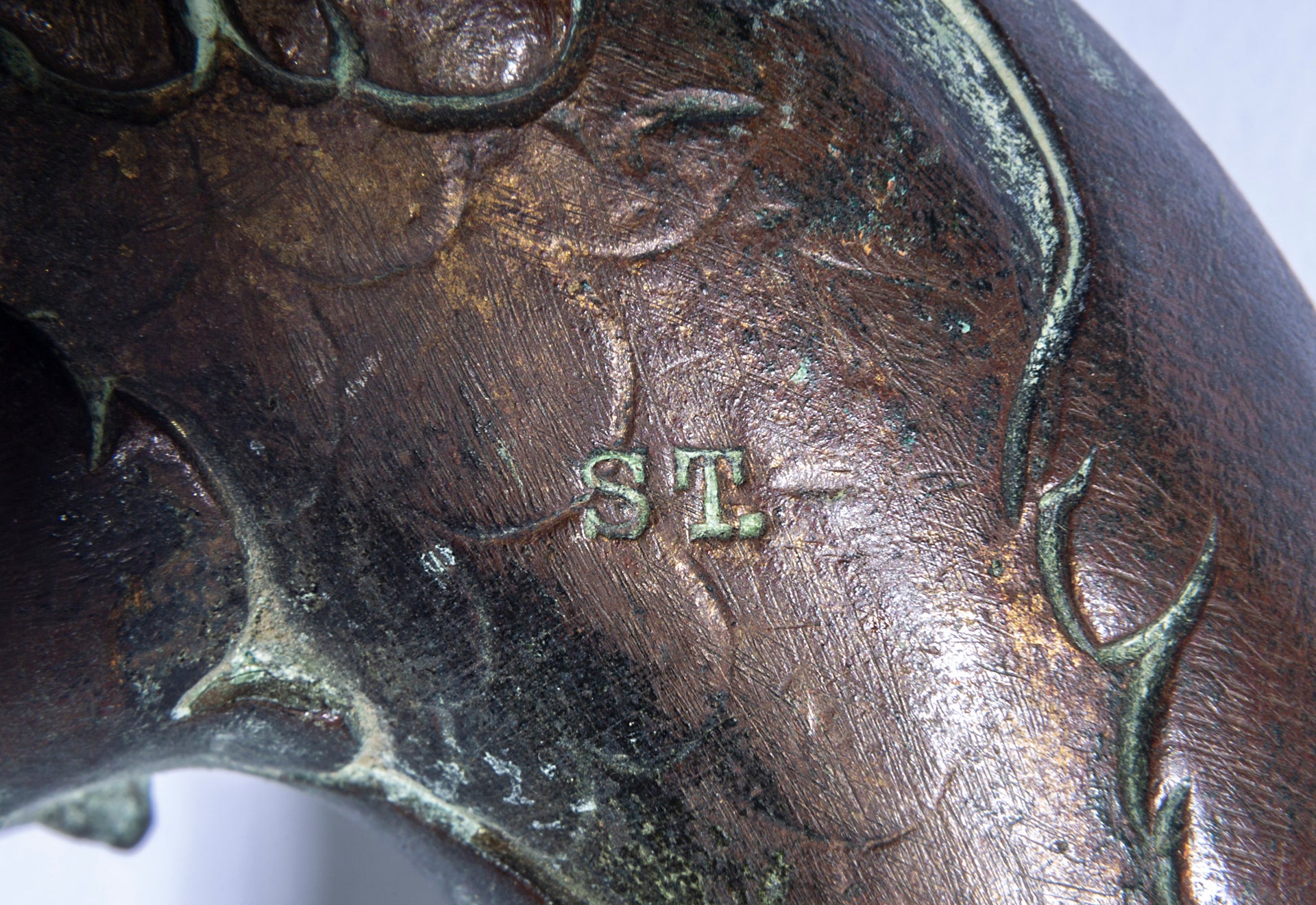 An exceptional pair of bronze door knockers, cast with the head of Neptune and twin dolphins French 19th Century