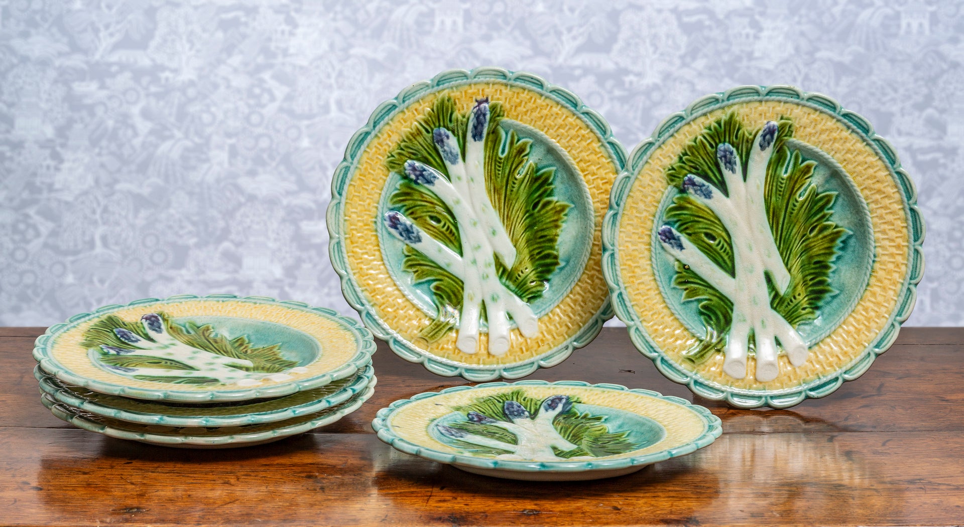 A beautiful set of six faience asparagus plates with scalloped edge, French 19th Century