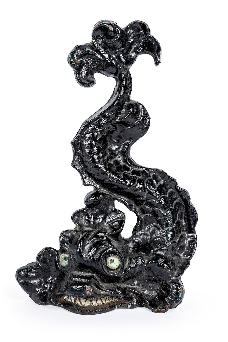 A whimsical black painted cast iron doorstop in the form of a sea monster, English 19th Century