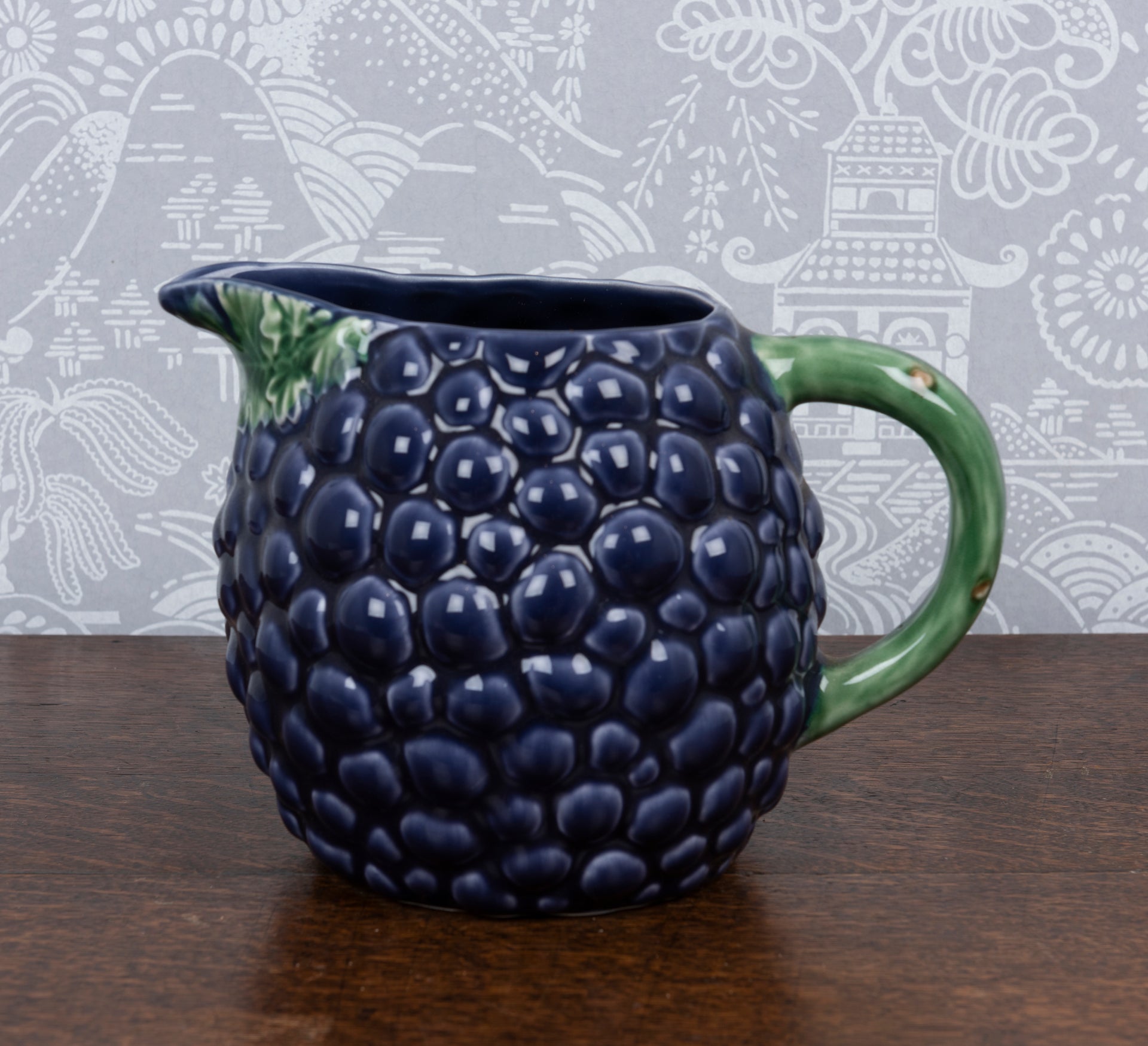 A purple grape pitcher by Bordallo Pinheiro, Portugal