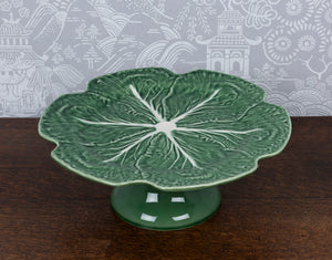 SOLD An earthenware green glazed cabbage leaf cake stand by Bordallo Pinheiro, Portugal