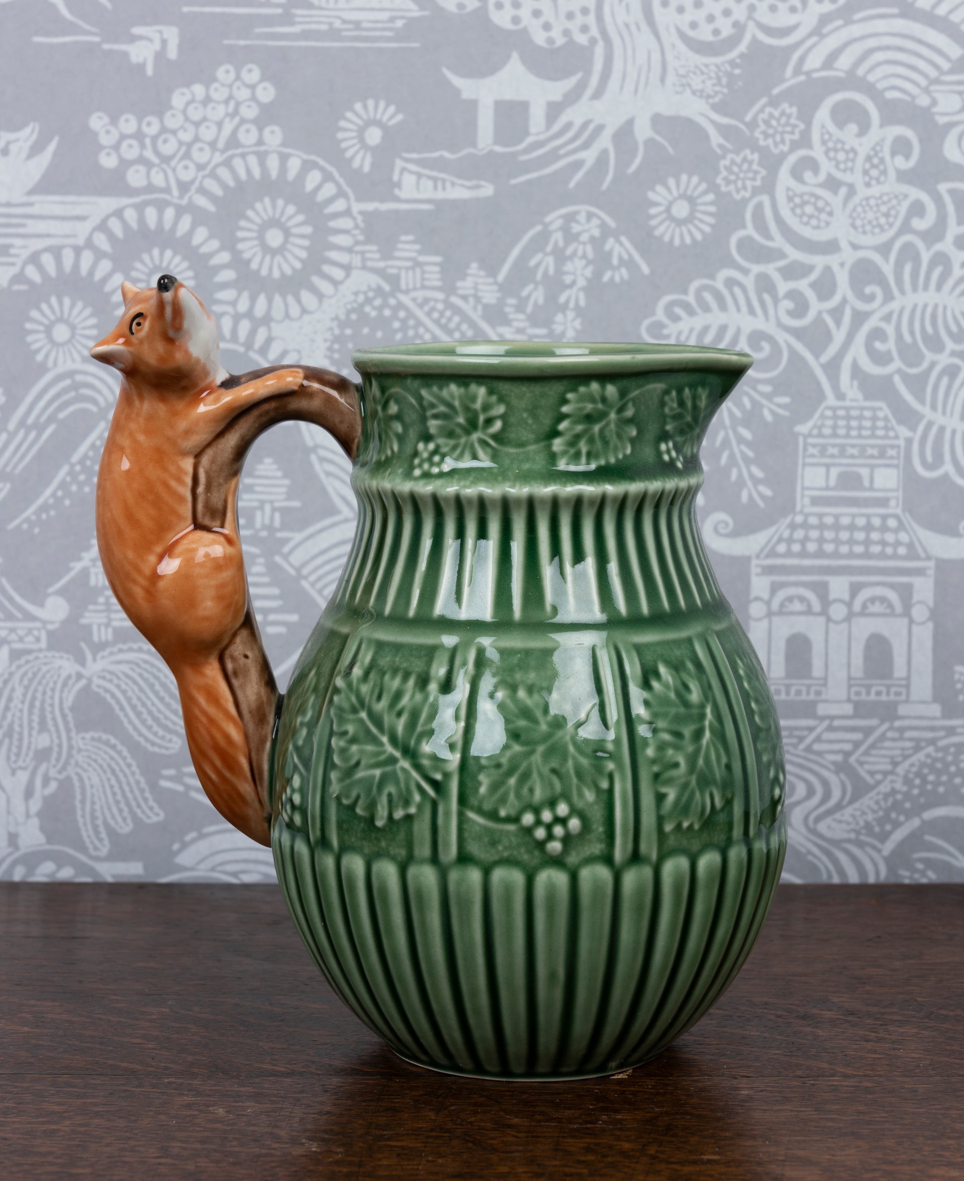 A vine pattern pitcher with fox handle, by Bordallo Pinheiro, Portugal