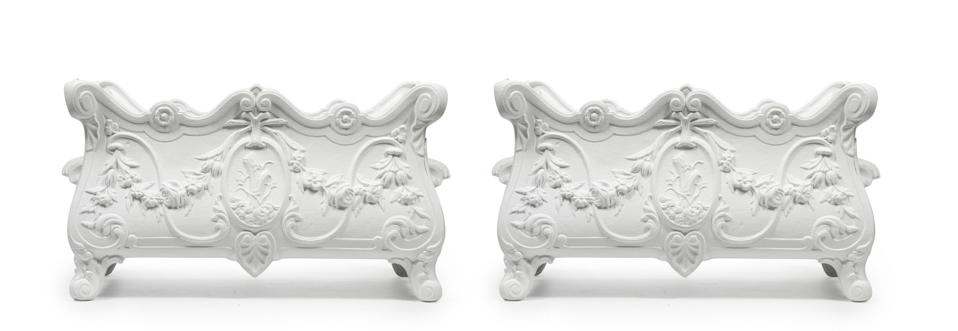 A beautiful pair of Louis XVI white painted cast iron jardinieres, French 19th Century