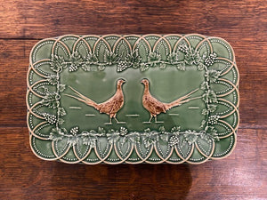 A rectangular Pheasant and vine design earthenware platter by Bordallo Pinheiro, Portugal